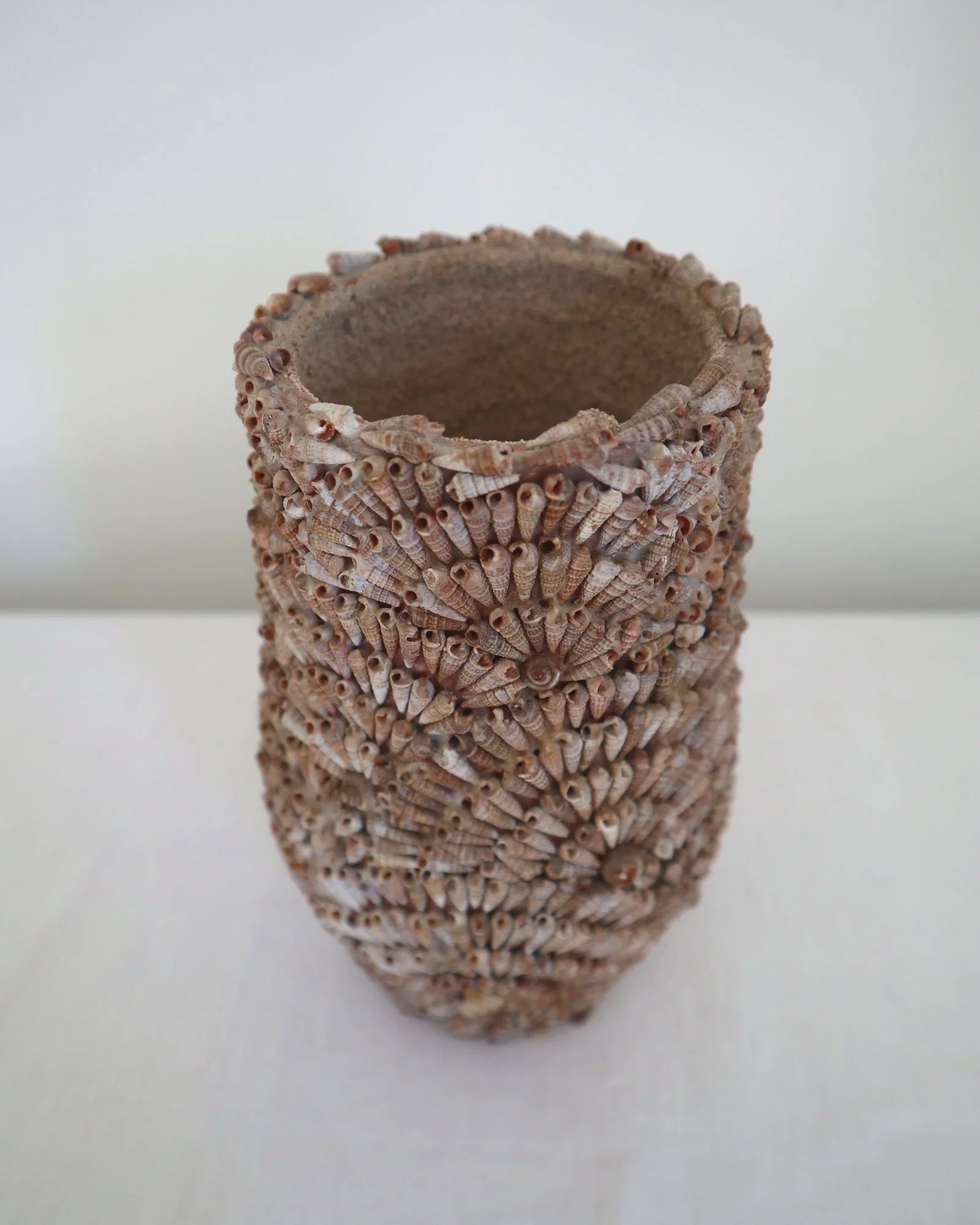 Vintage, handcrafted seashell-encrusted vase or vessel, likely French. Circa 1960s.
