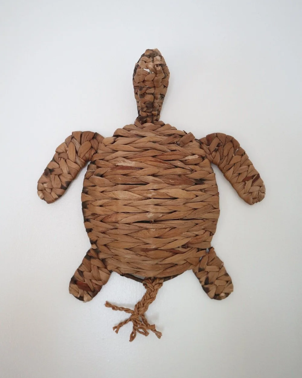 Set of two vintage turtle wall hangings handmade with woven natural water hyacinth.
