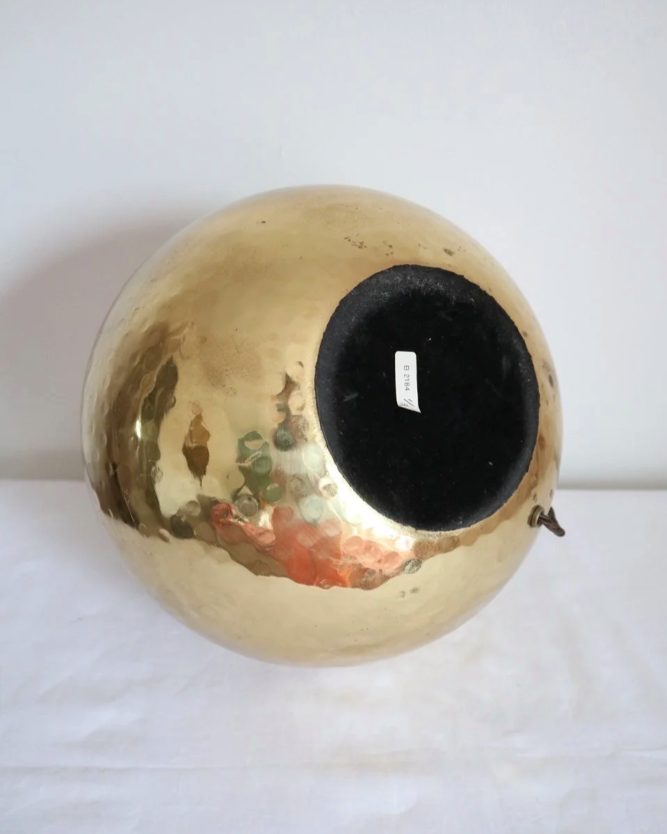 Pair of large, vintage beaten brass spherical table lamps with etched decoration.