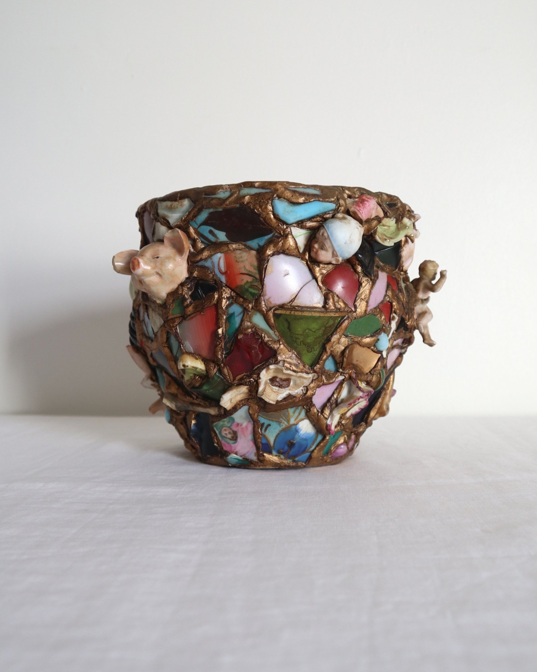 Quirky and characterful pique assiette mosaic pottery plant pot.
