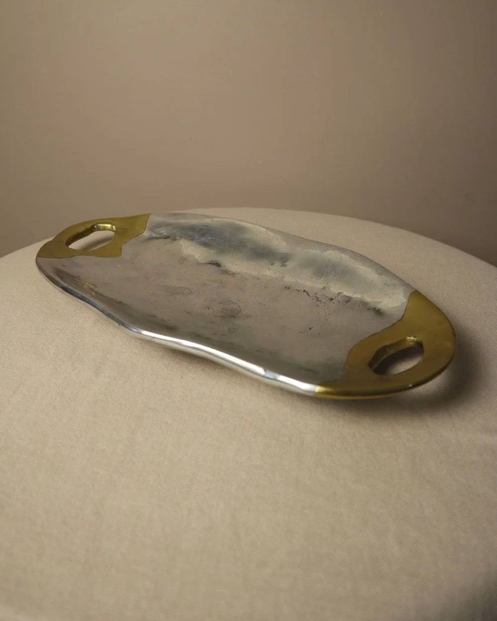 Brutalist heavy cast aluminium and brass decorative shallow bowl /dish by David Marshall, circa 1970s.