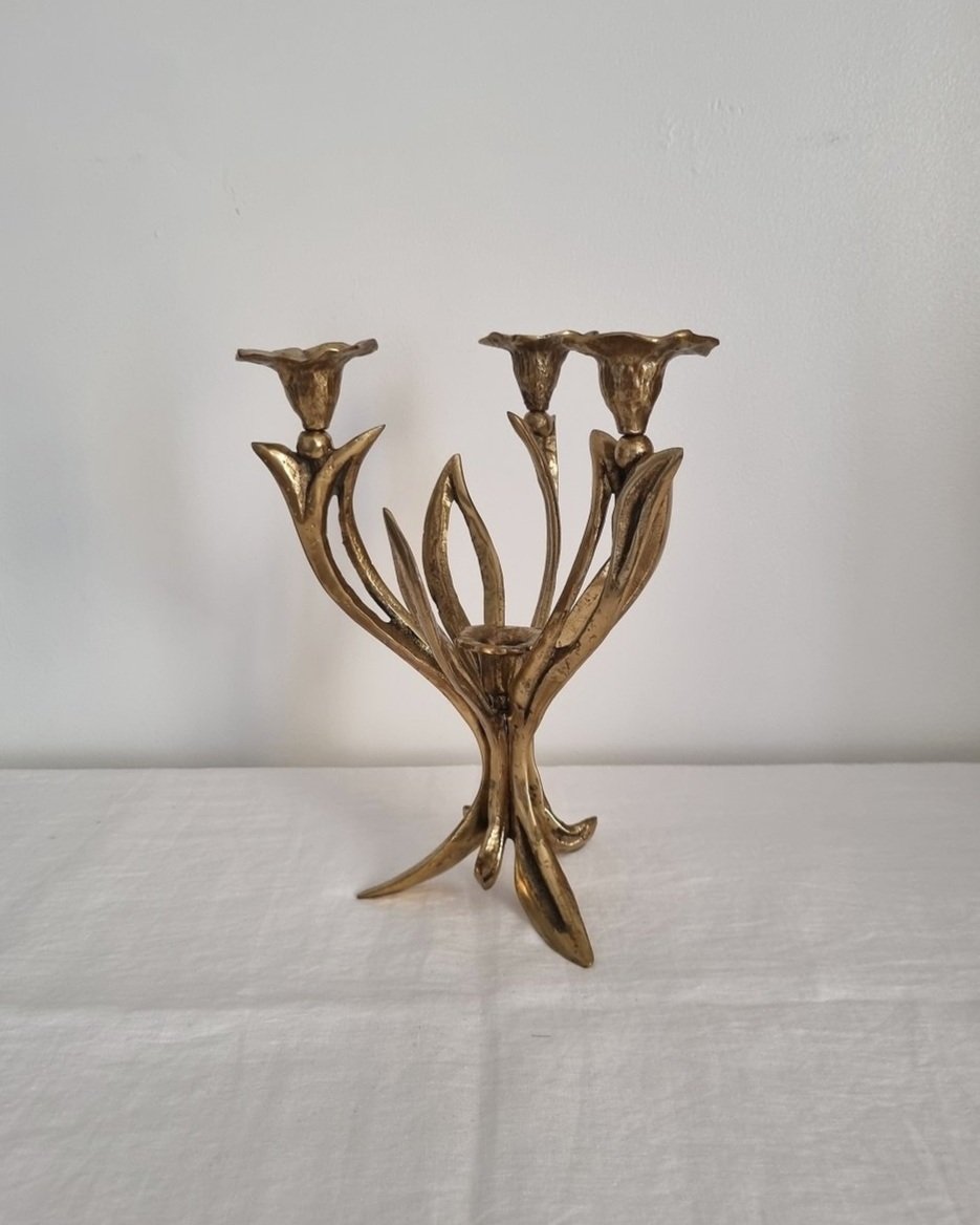 Mid century Art Nouveau style floral heavy brass candelabra with three arms and central candleholder. Circa 1970s.