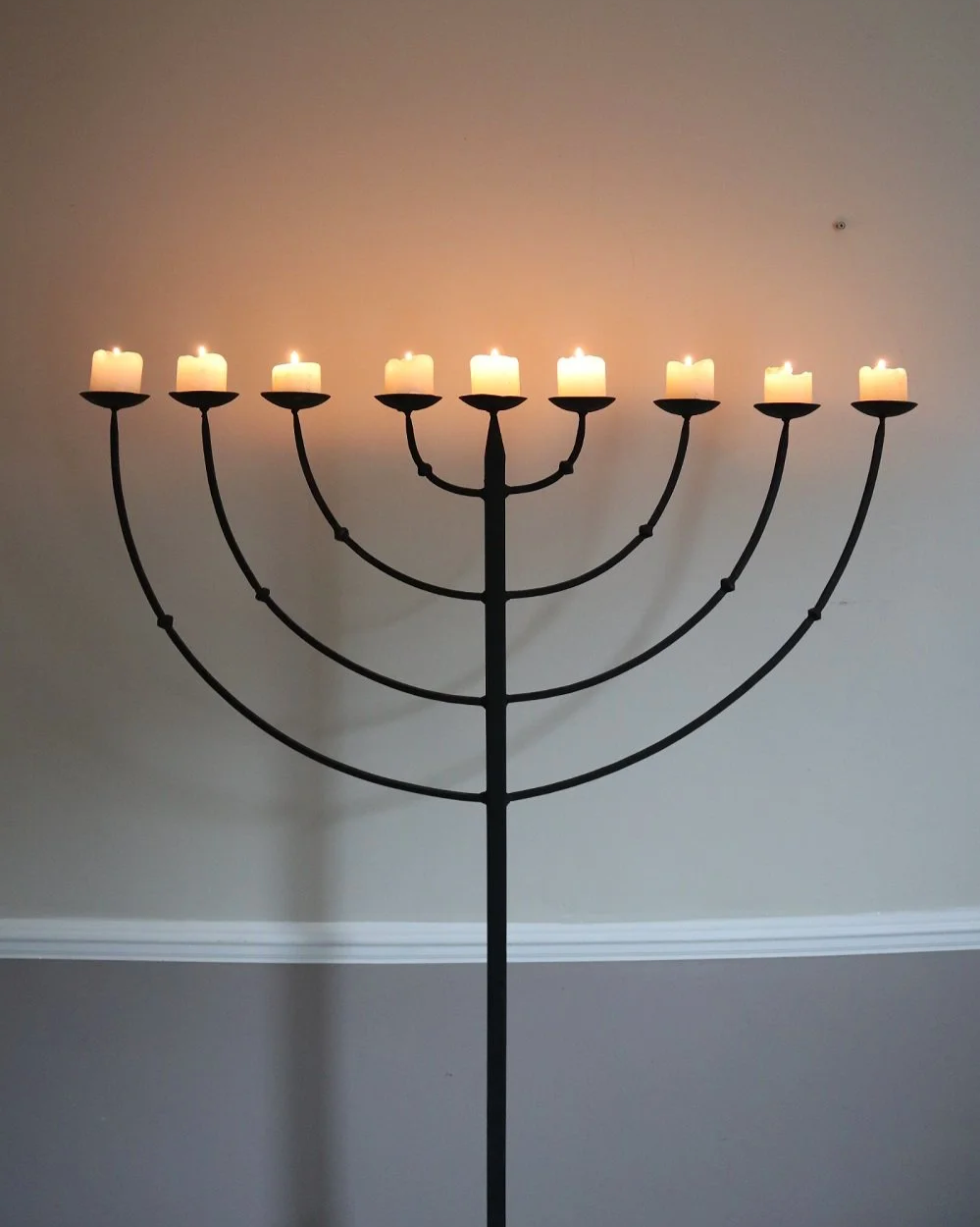 Large Brutalist wrought iron 9 arm Hanukkah candleholder. Circa 1970s.