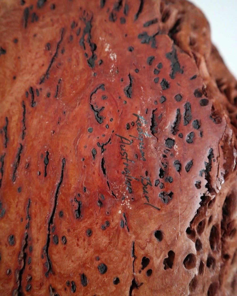 Large Australian hand carved red gum burl wood centrepiece bowl with polished centre and organic naturalistic outside. Signed 'M Bailey' and original Merv Bailey sticker to base.