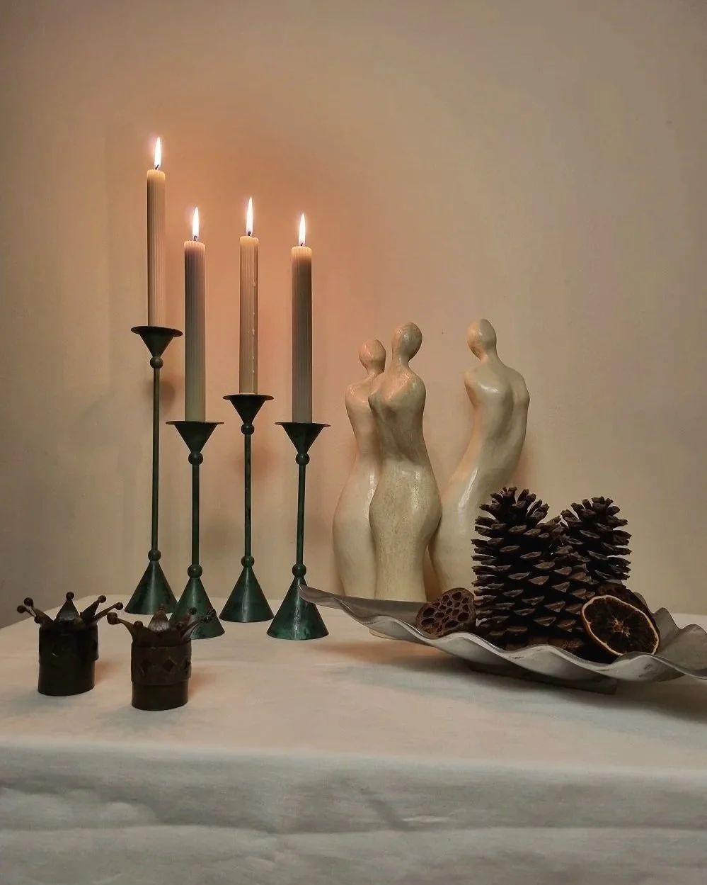 Set of three white ceramic abstract sculptures in the shape of the female form. Unknown age.  Signed 'R W Art / RoseWood Art'