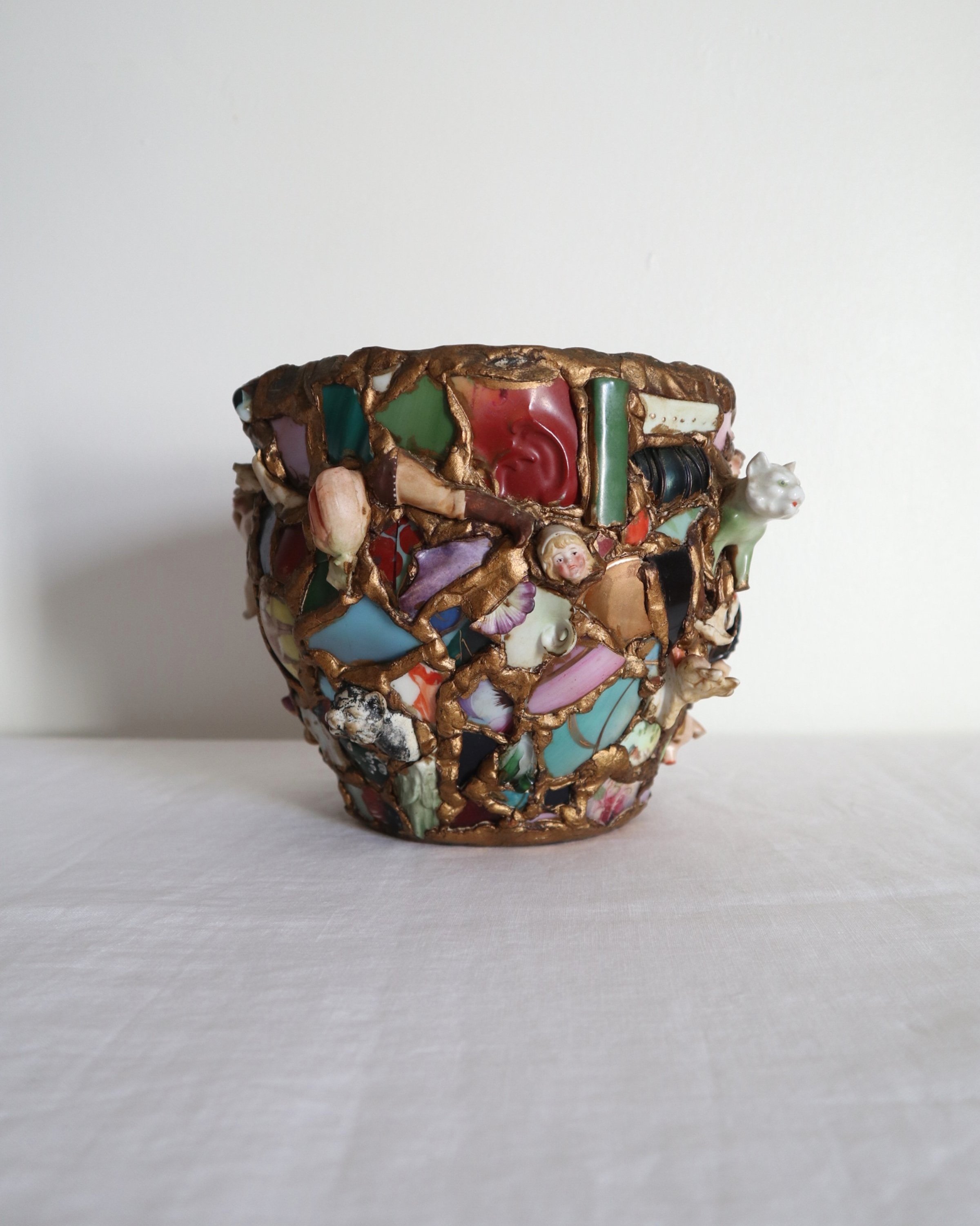 Quirky and characterful pique assiette mosaic pottery plant pot.