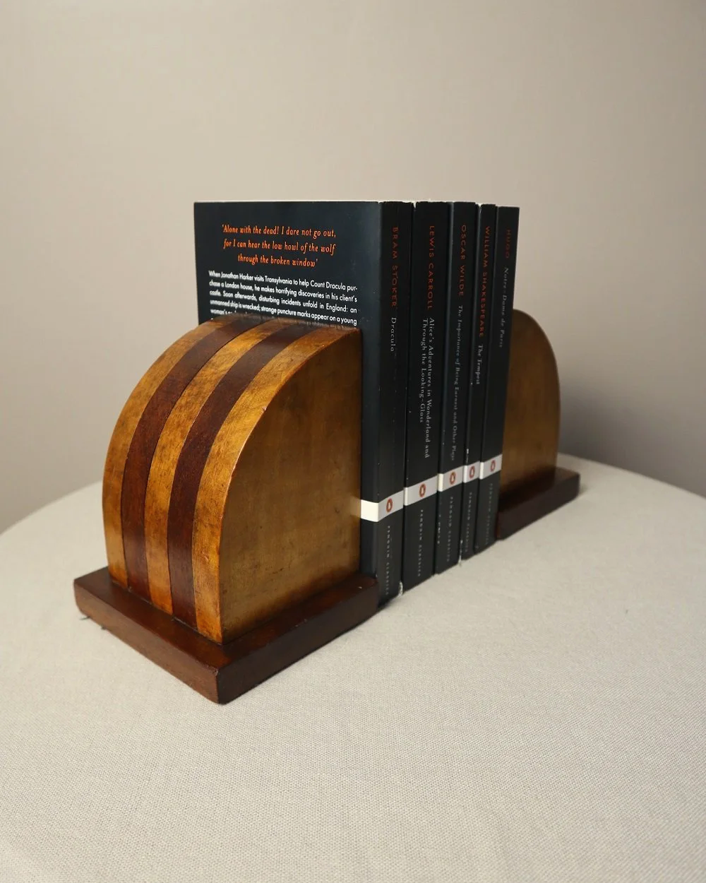 Vintage Art Deco style two tone arched wooden bookends.