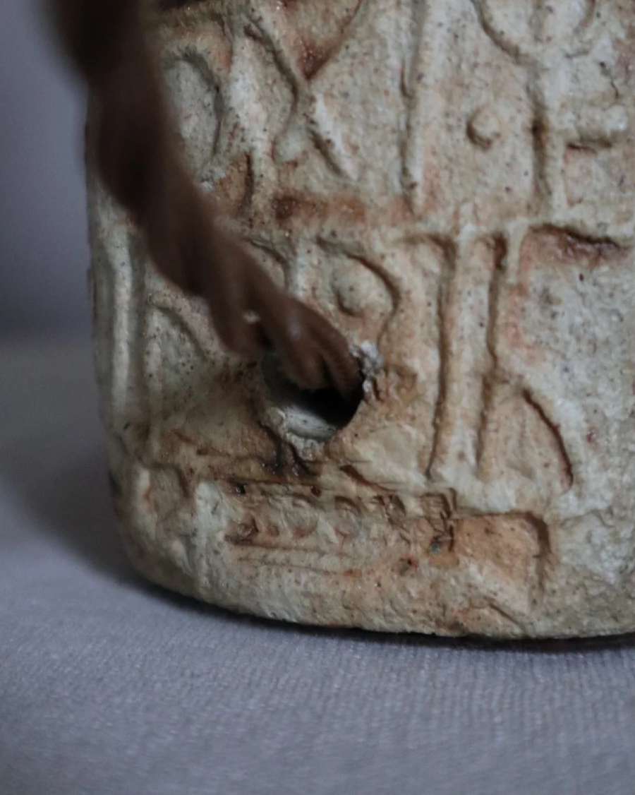 Small Brutalist stoneware table lamp by British potter Bernard Rooke. With stamped, rune-like impressions. Circa 1970s.