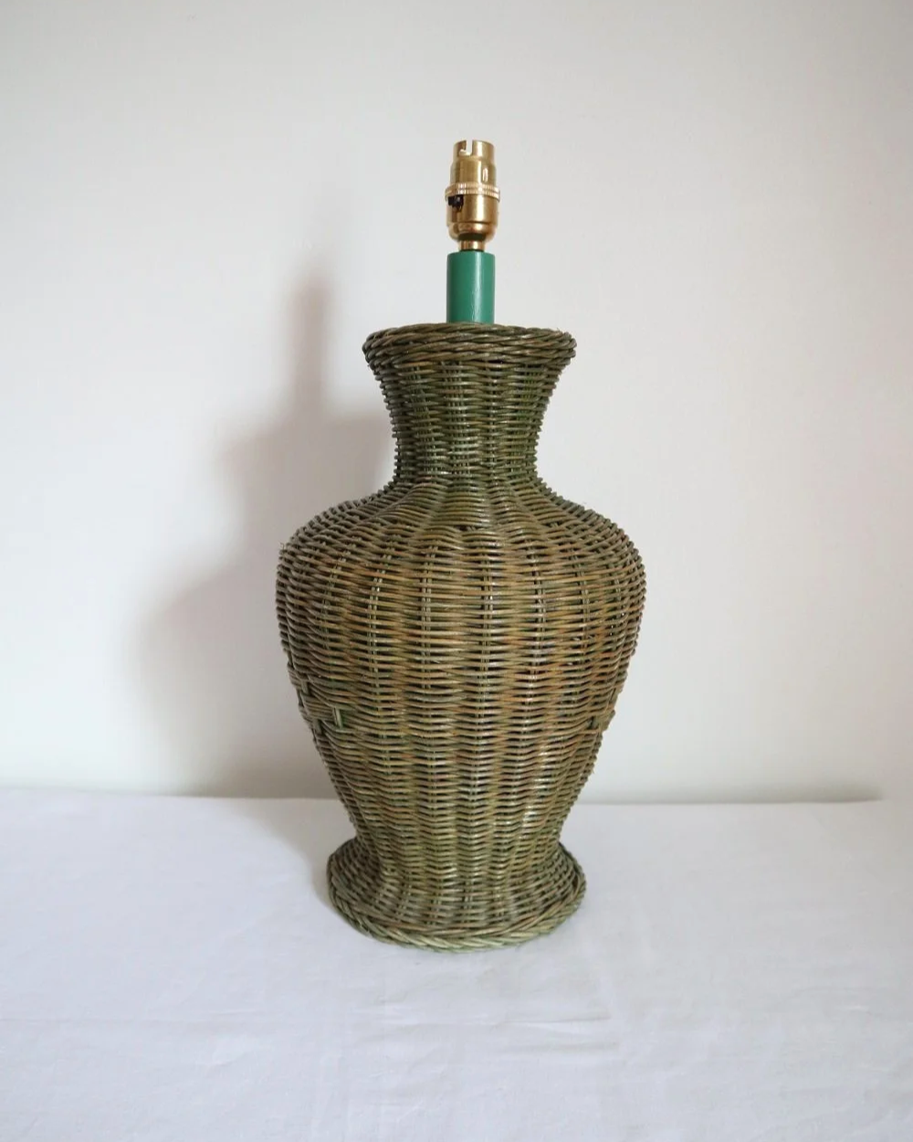 Vintage, large painted green woven wicker table lamp with new, vertical striped cotton lampshade.