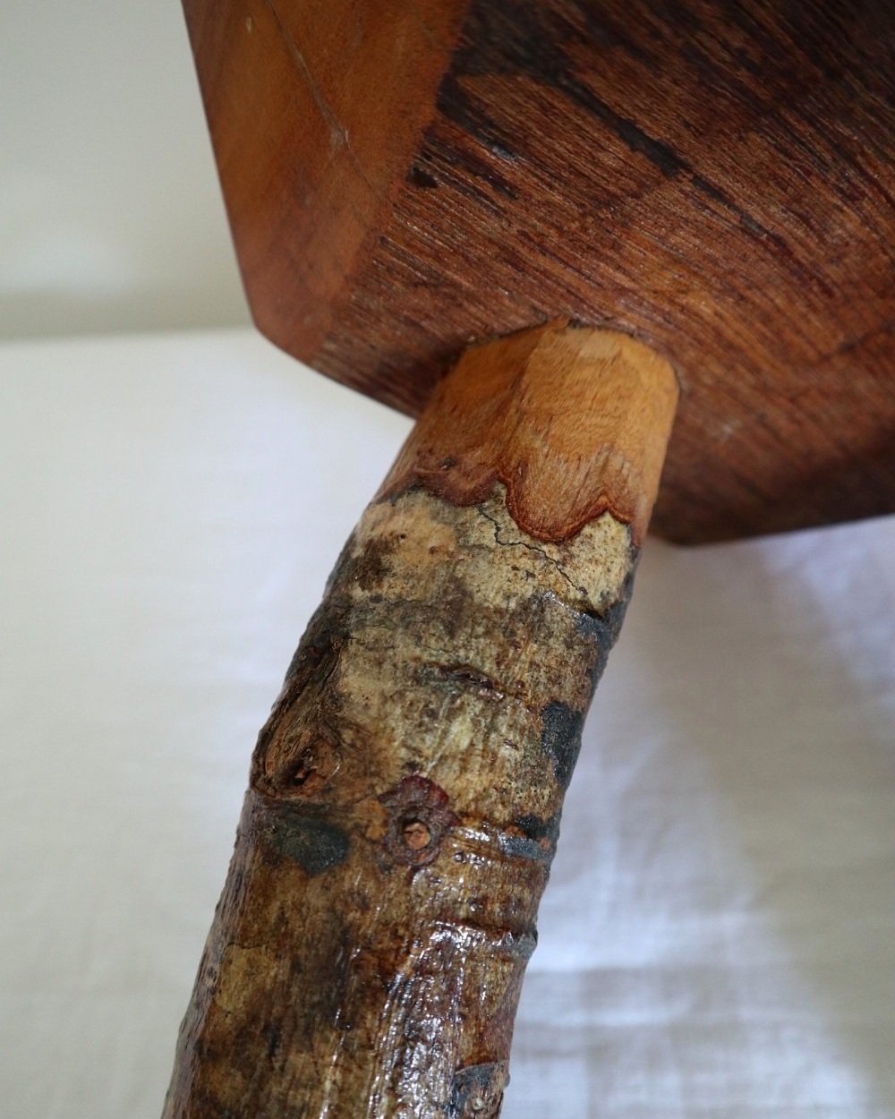 Vintage small rustic folk art handmade wooden stool from Fenterleigh Woodcraft, Tintagel Cornwall, Circa 1940s.