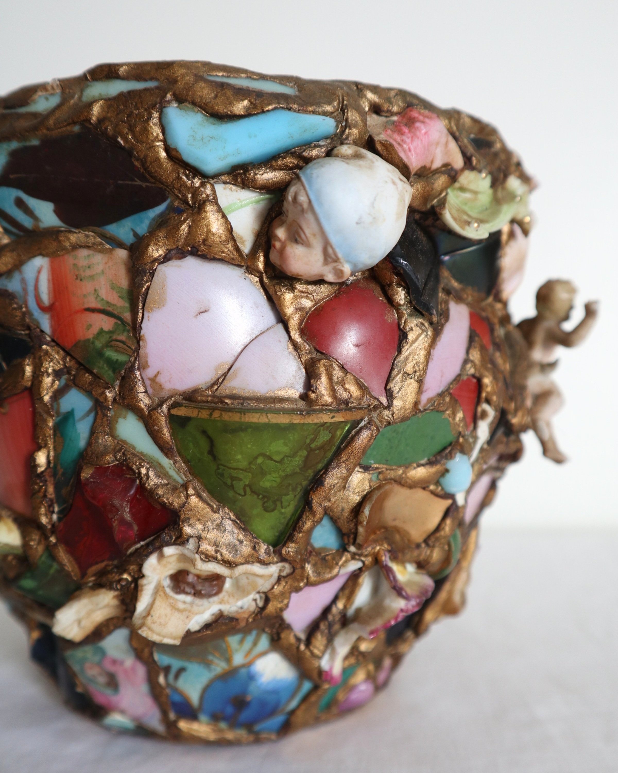 Quirky and characterful pique assiette mosaic pottery plant pot.