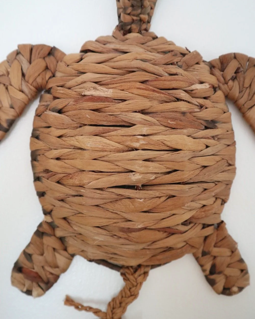 Set of two vintage turtle wall hangings handmade with woven natural water hyacinth.