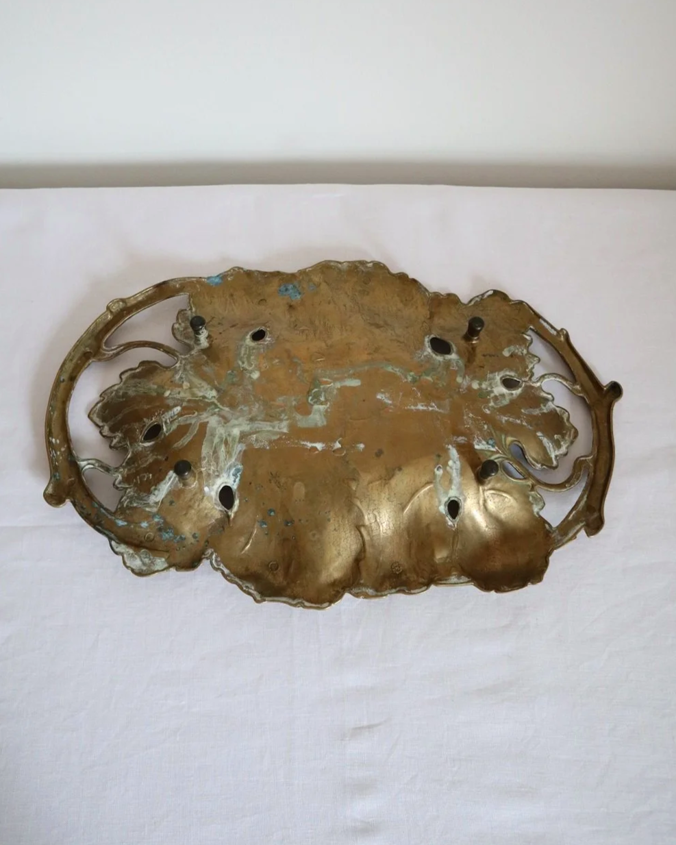 Vintage solid brass decorative Art Nouveau dish of intertwined grapevine leaves, circa 1960s.