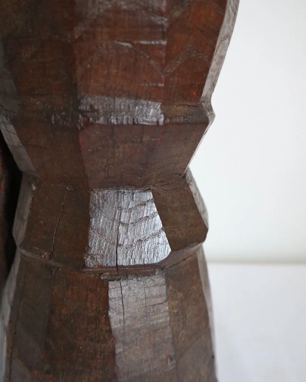 Heavy primitive sculptural carved wooden mortar with handle.
