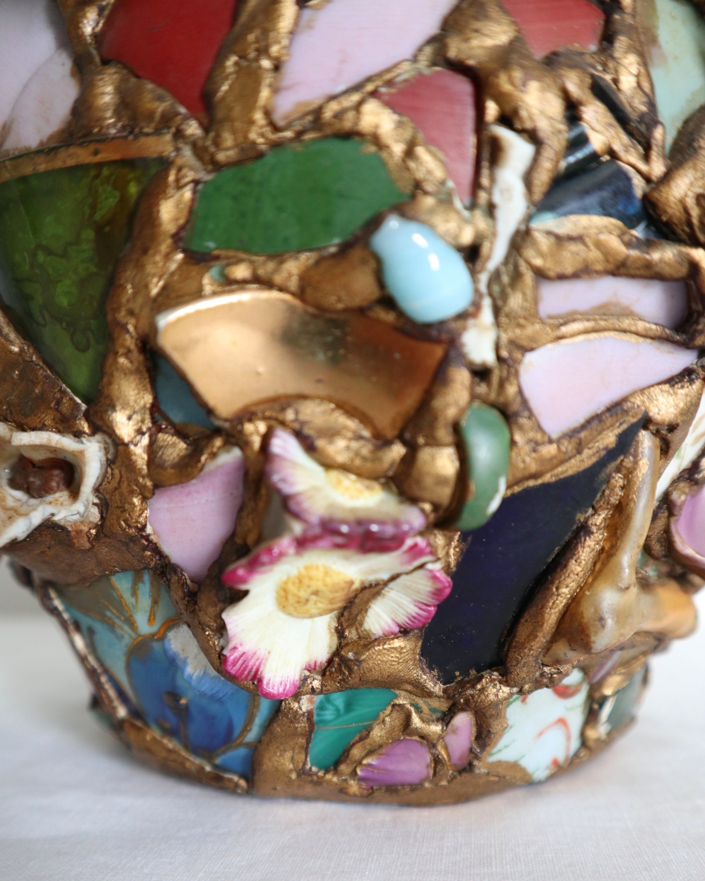 Quirky and characterful pique assiette mosaic pottery plant pot.