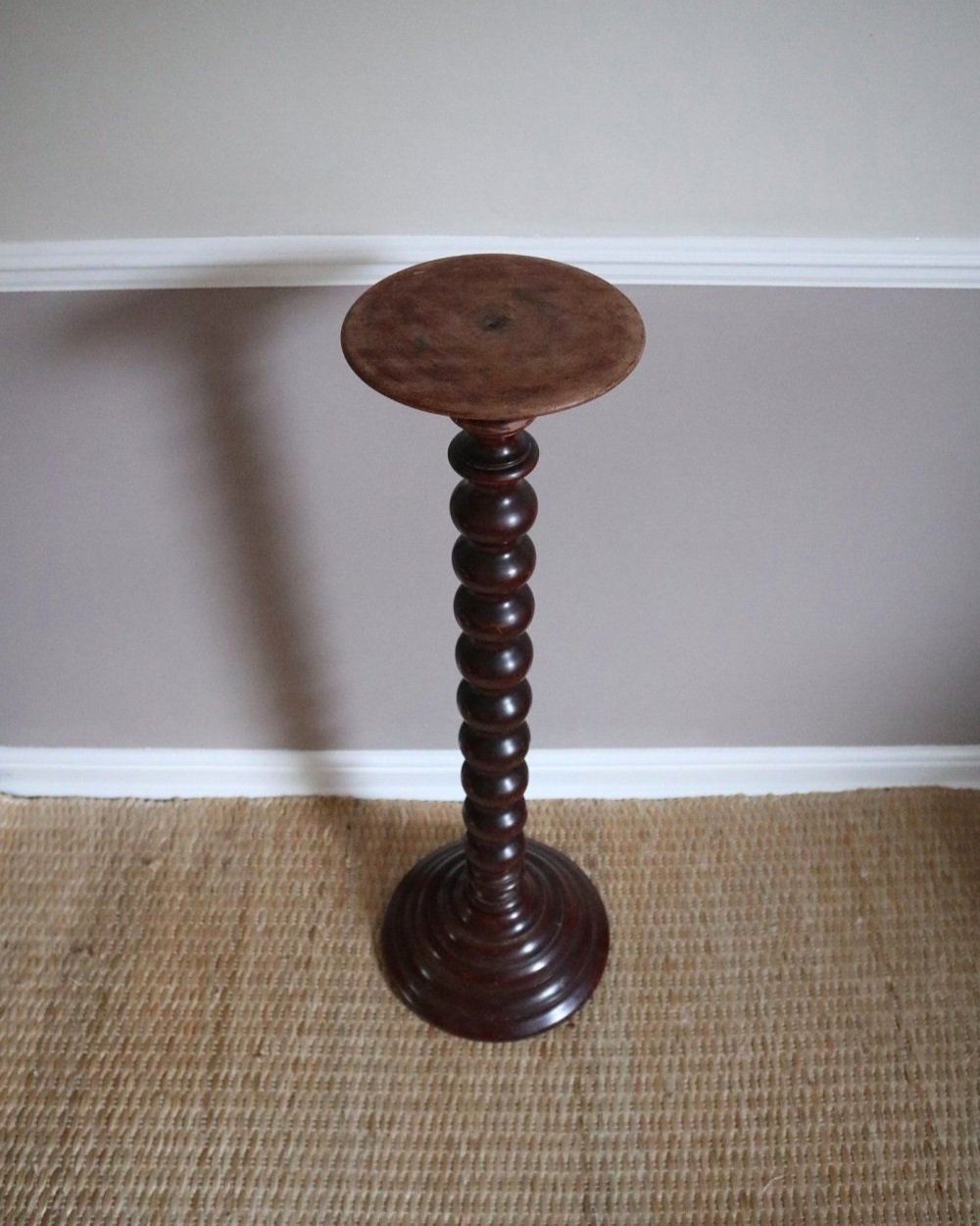 Tall mid century darkwood jardiniere plant stand display plinth with carved bobbin column and heavy turned wood base.