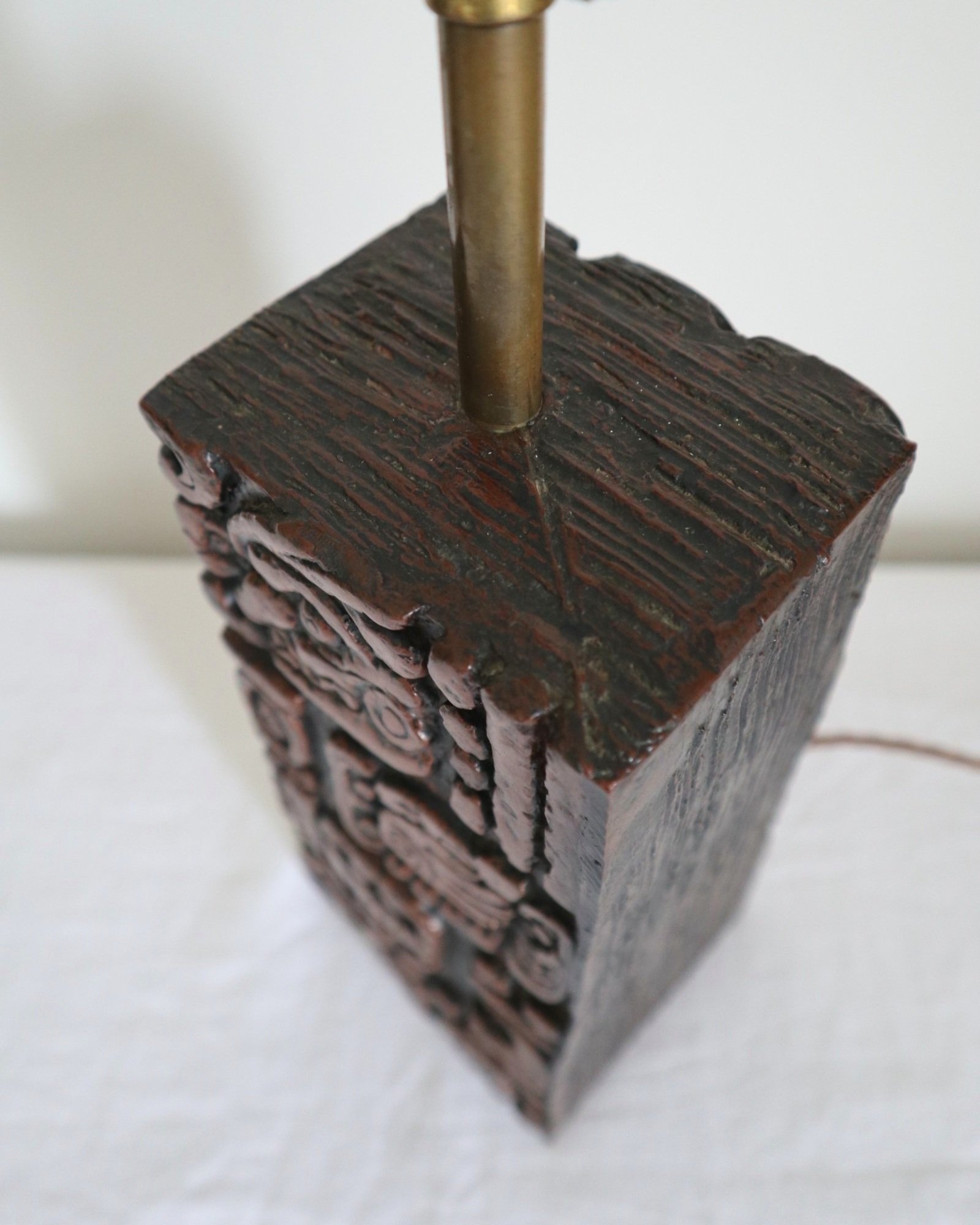 Mid century very heavy Brutalist Aztec style cast resin table lamp with metallic bronze finish.