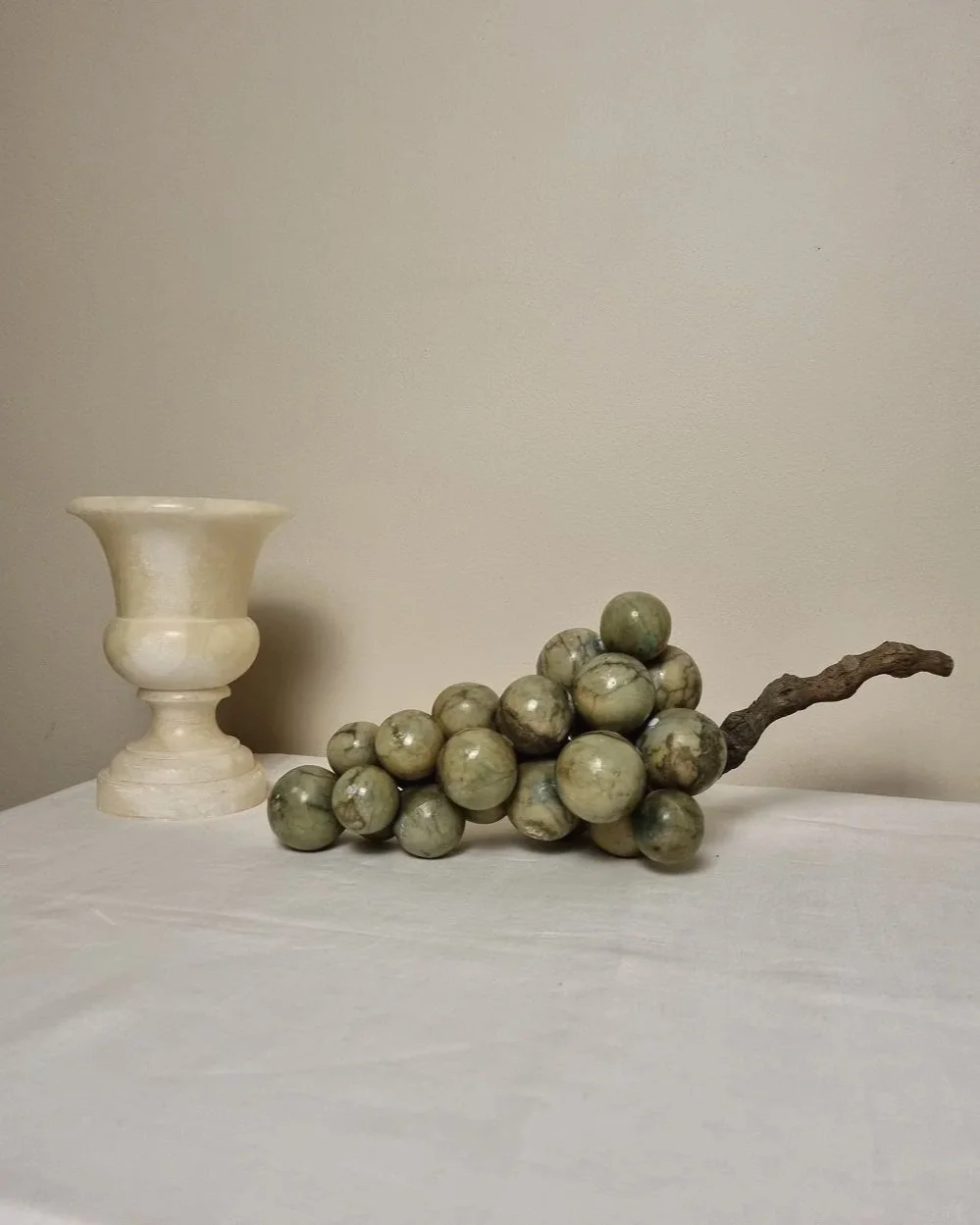 Large 1970s cluster of green alabaster grapes with real vine stem.
