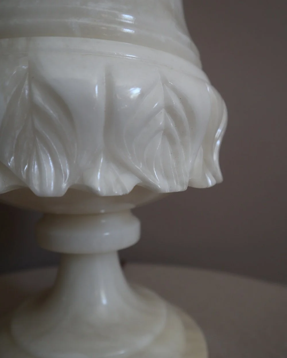 Large Italian carved alabaster urn table lamp, with delicate petal details.