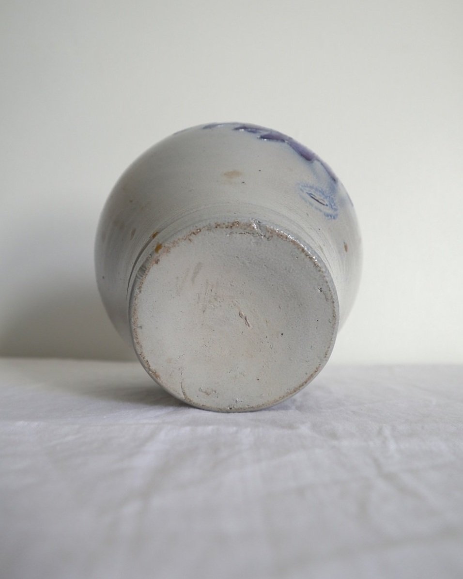 Large vintage German Westerwald salt glazed stoneware flagon with cobalt blue foliage decoration and two bands to the neck.