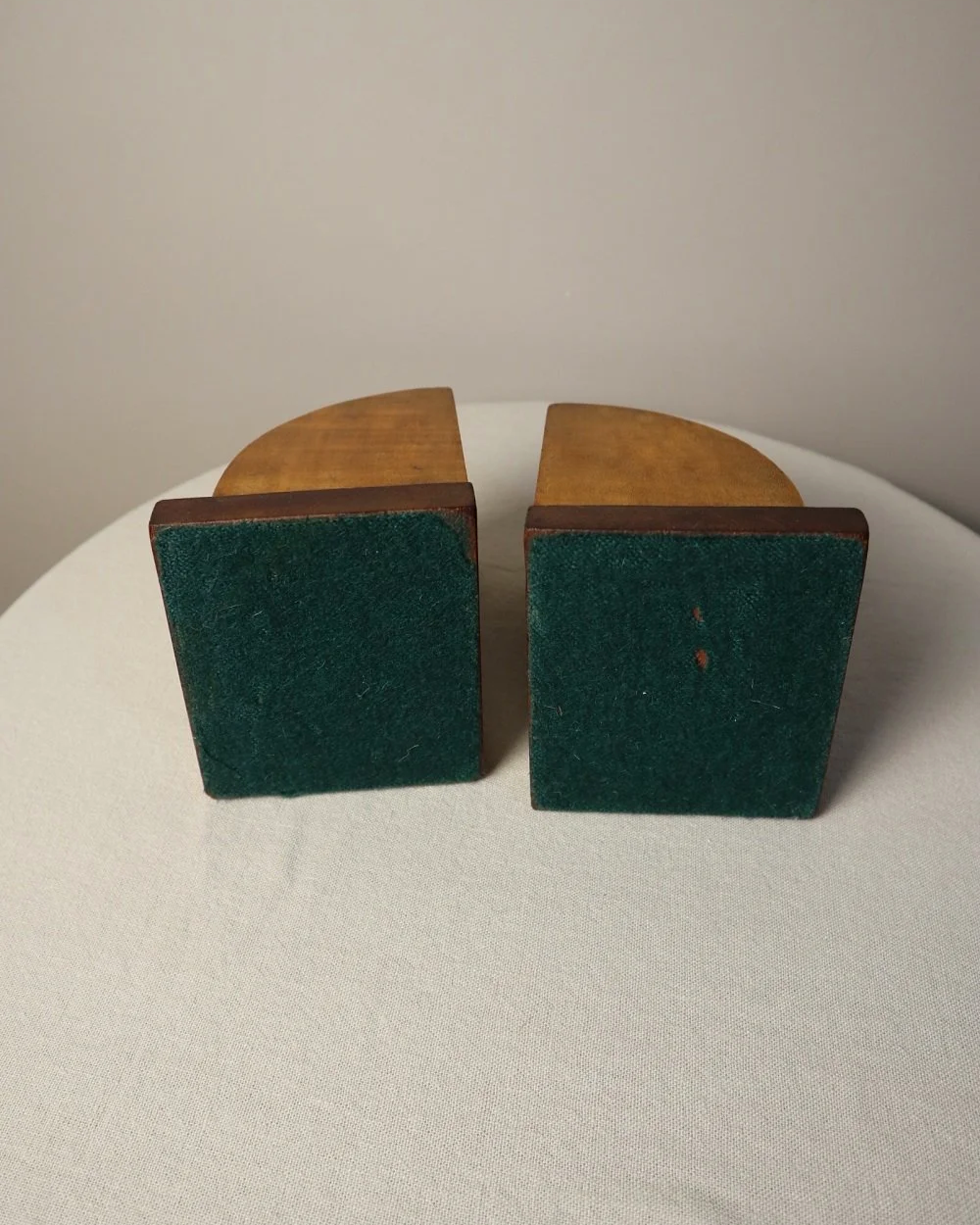 Vintage Art Deco style two tone arched wooden bookends.