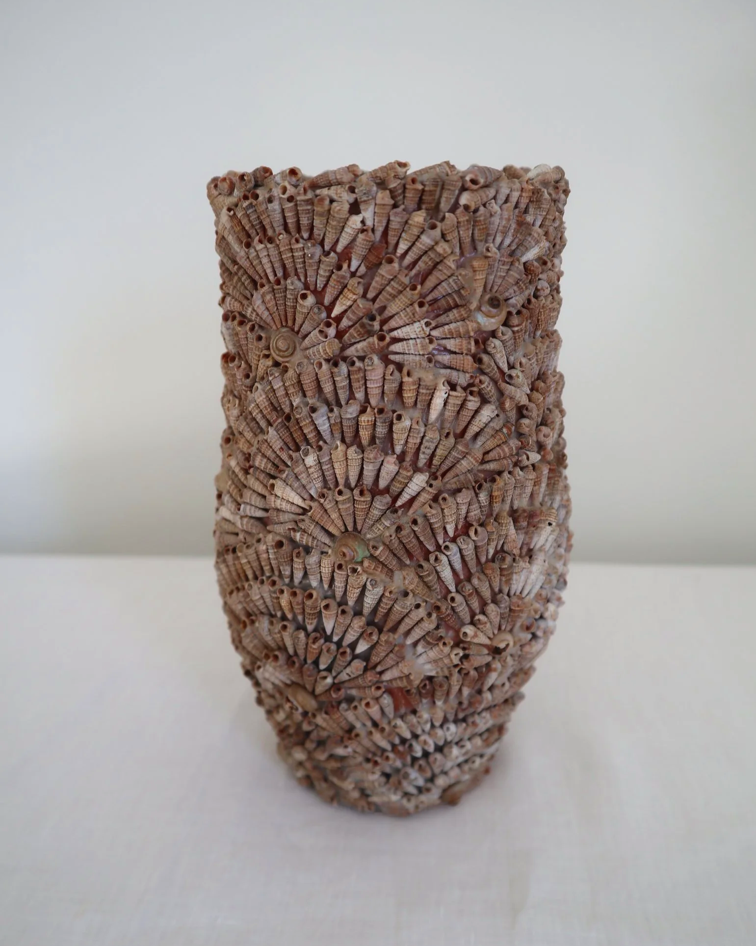 Vintage, handcrafted seashell-encrusted vase or vessel, likely French. Circa 1960s.