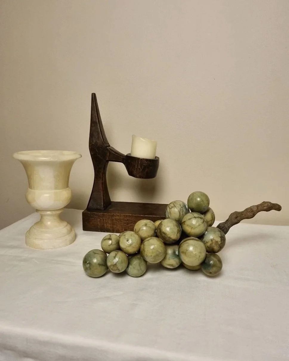 American hand carved dark wooden Brutalist candleholder with block base.