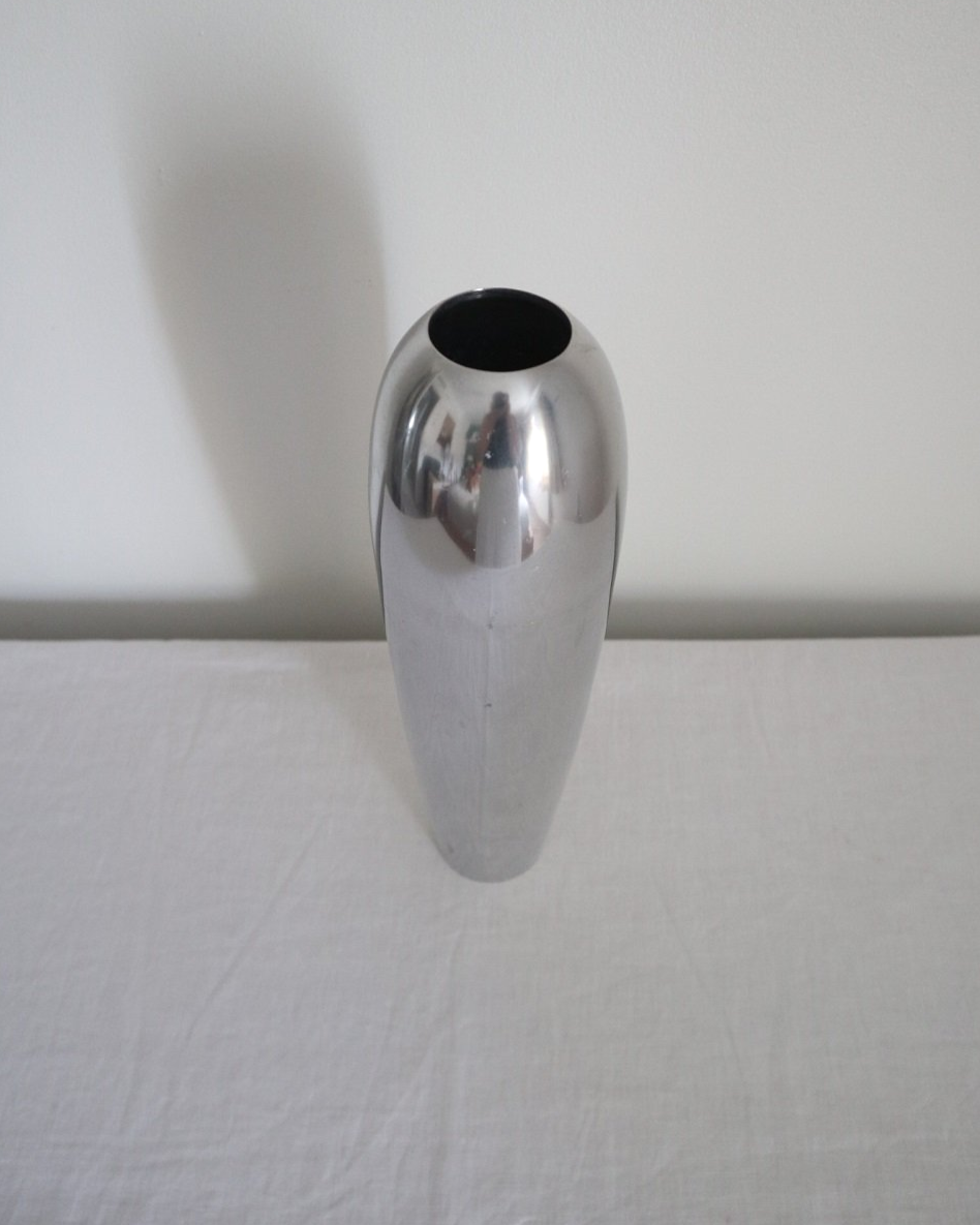 Modernist style tall aluminium bullet vase, Circa 1990s.