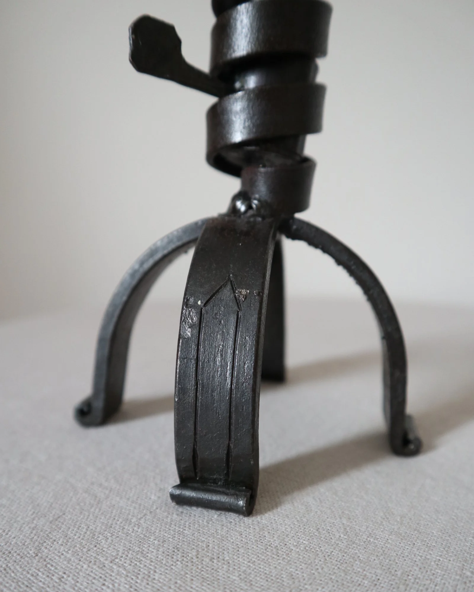 Vintage wrought iron ‘rat de cave’ style candleholder with turning spiral mechanism which raises the candle as it burns lower.