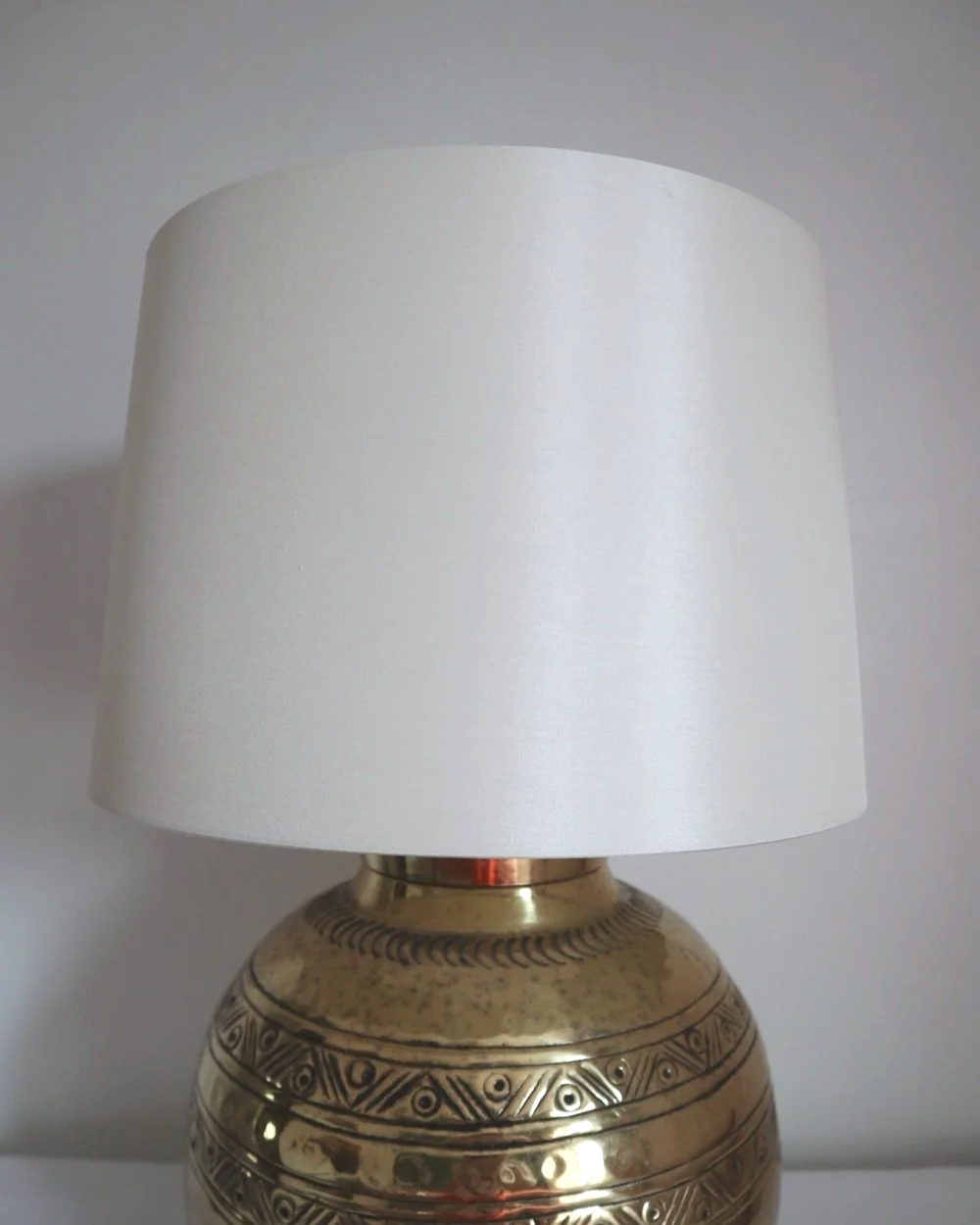 Pair of large, vintage beaten brass spherical table lamps with etched decoration.