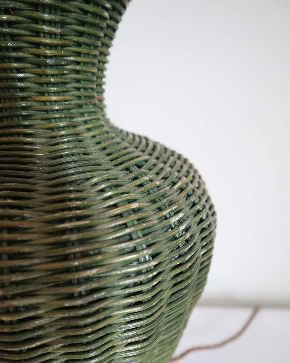 Vintage, large painted green woven wicker table lamp with new, vertical striped cotton lampshade.