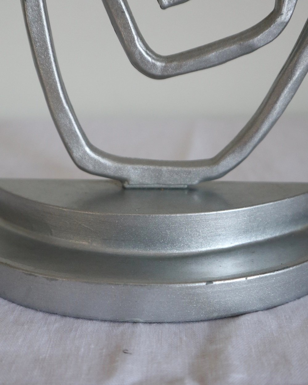 Pair of Postmodern sprayed silver spiral bookends, circa 1990s.