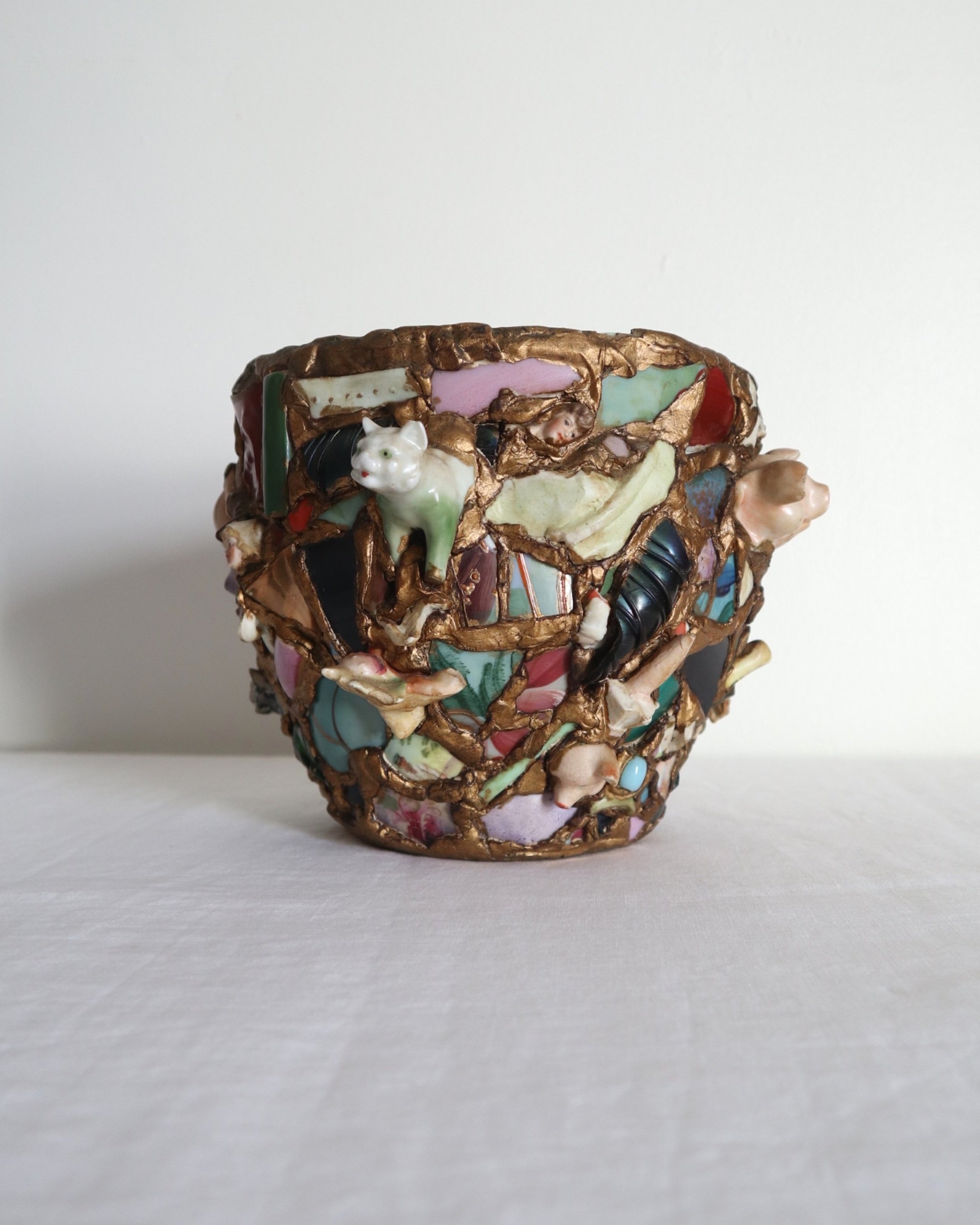 Quirky and characterful pique assiette mosaic pottery plant pot.
