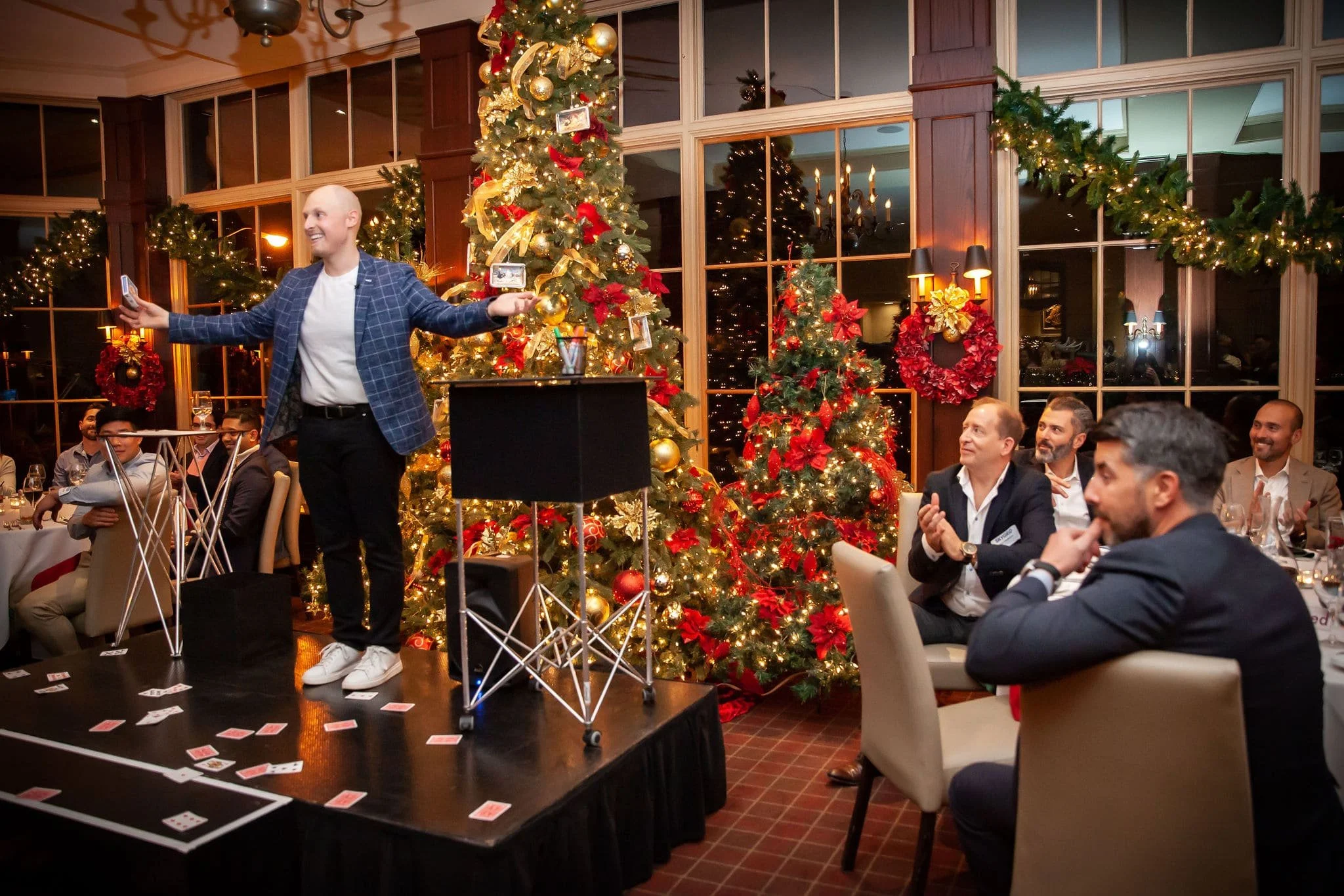 Corporate holiday party magician entertaining guests in Toronto