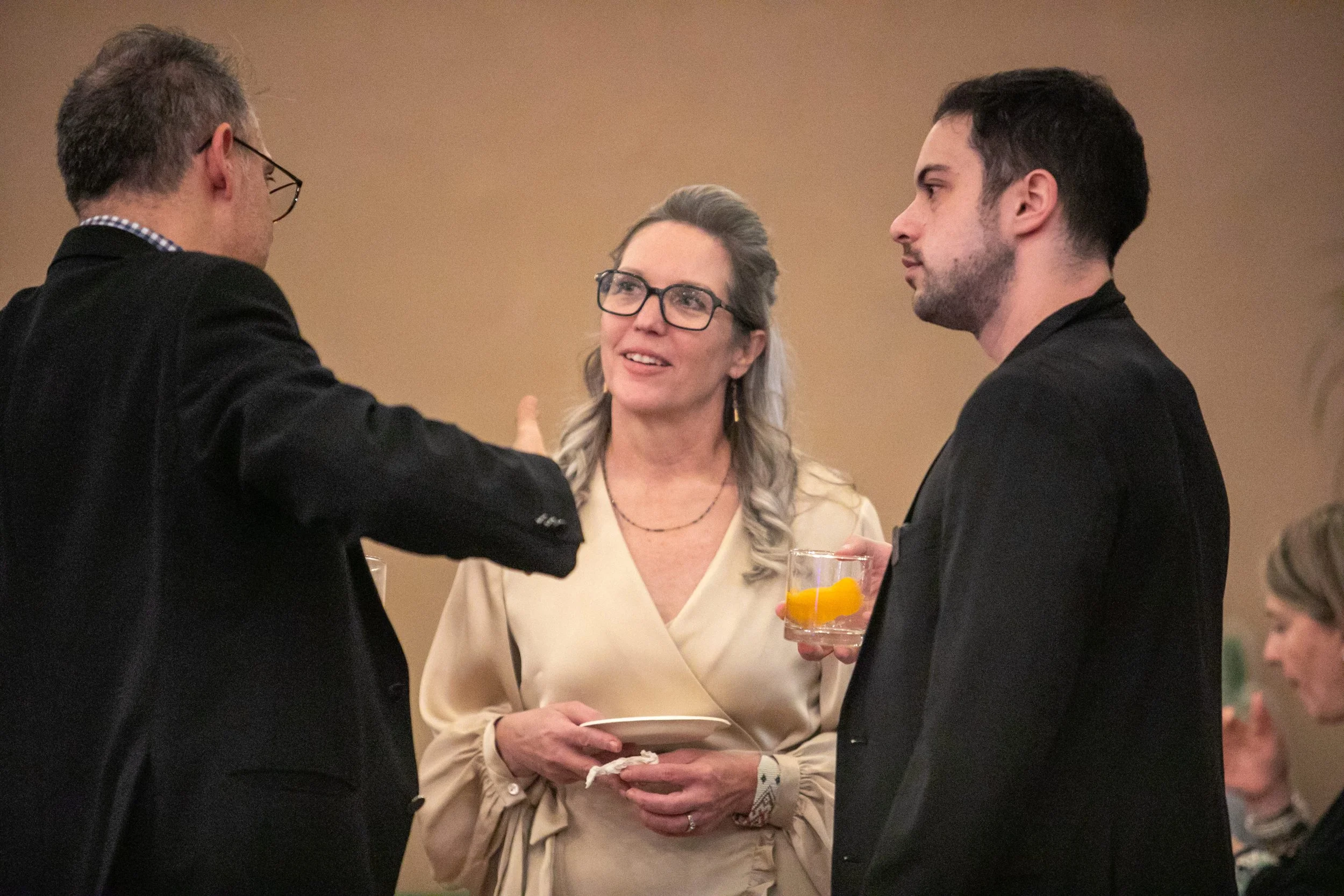 Magician connecting guests during a networking session