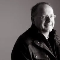 Alister Christopher, Group Vice President at Gartner Consulting, black and white portrait
