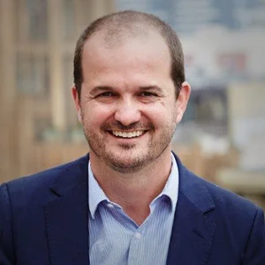 Scott Bocskay, CEO of Sustainable Australia, smiling outdoors in a blue blazer