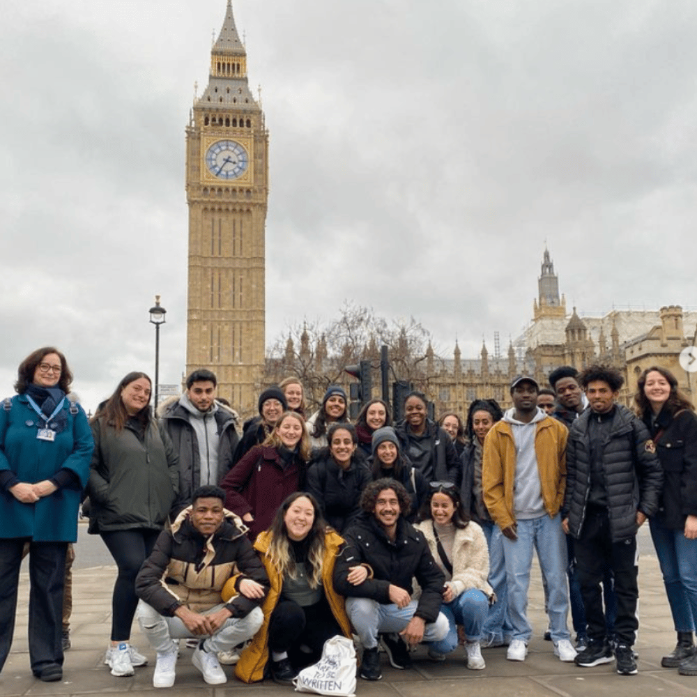 A tour group in front of Big Ben in London