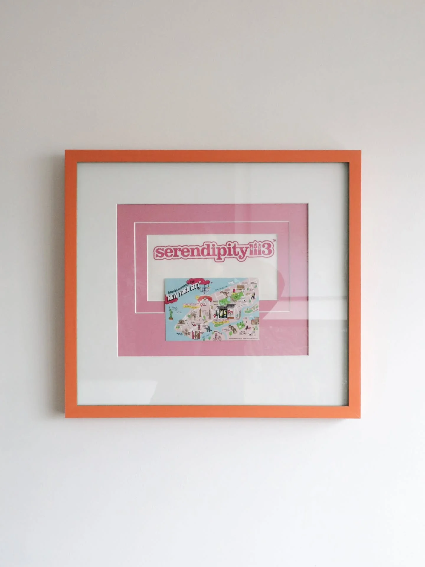Homage to a colourful cafe and icon of NYC. @serendipity3nyc

Bespoke orange and green frame, sink mounted napkin, surface mounted postcard, shadow-mat and spacers all topped off with 99%UV glass.

We are always happy to help turn your holiday mement