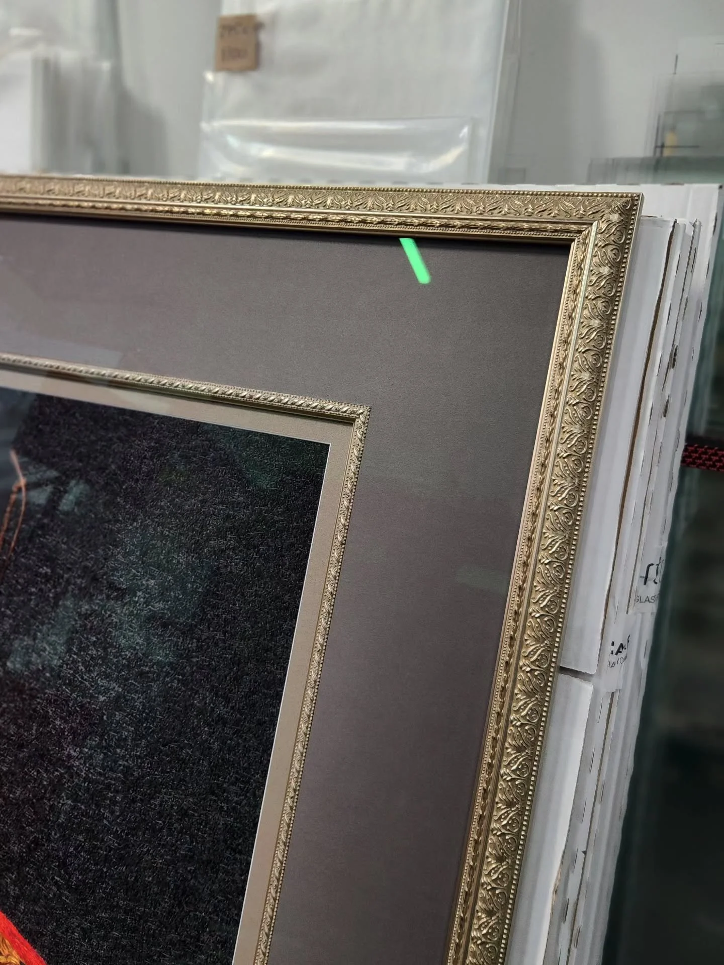 More often than not, I fail to get a decent photograph before a piece is collected...

Hours of work condensed into a quick snapshot. A great example of a more traditional style; double matboard, fillet, ornate frame to match and low-reflection glass