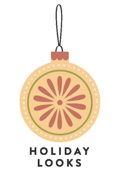 A Christmas ornament with a lemon slice design, hanging from a black string, with the words 'Holiday Looks' below.