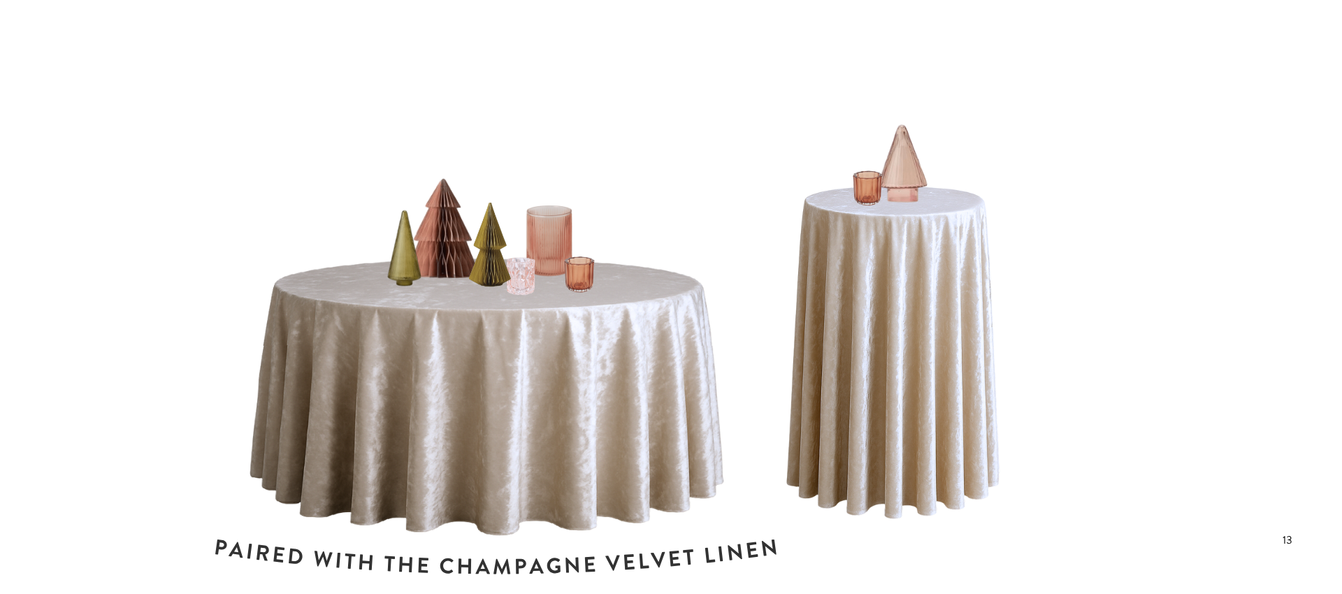 Two tables with beige satin tablecloths and holiday-themed decorations, including paper tree ornaments and small glass candles.