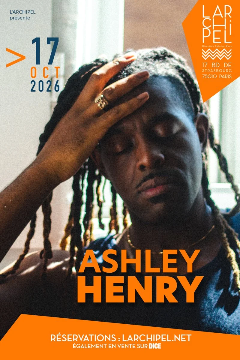 Poster featuring a portrait of a young man with dreadlocks, closing his eyes, with a hand on his forehead, for a performance by Ashley Henry at L'Archipel in Paris from October 17 to 26, 2026.