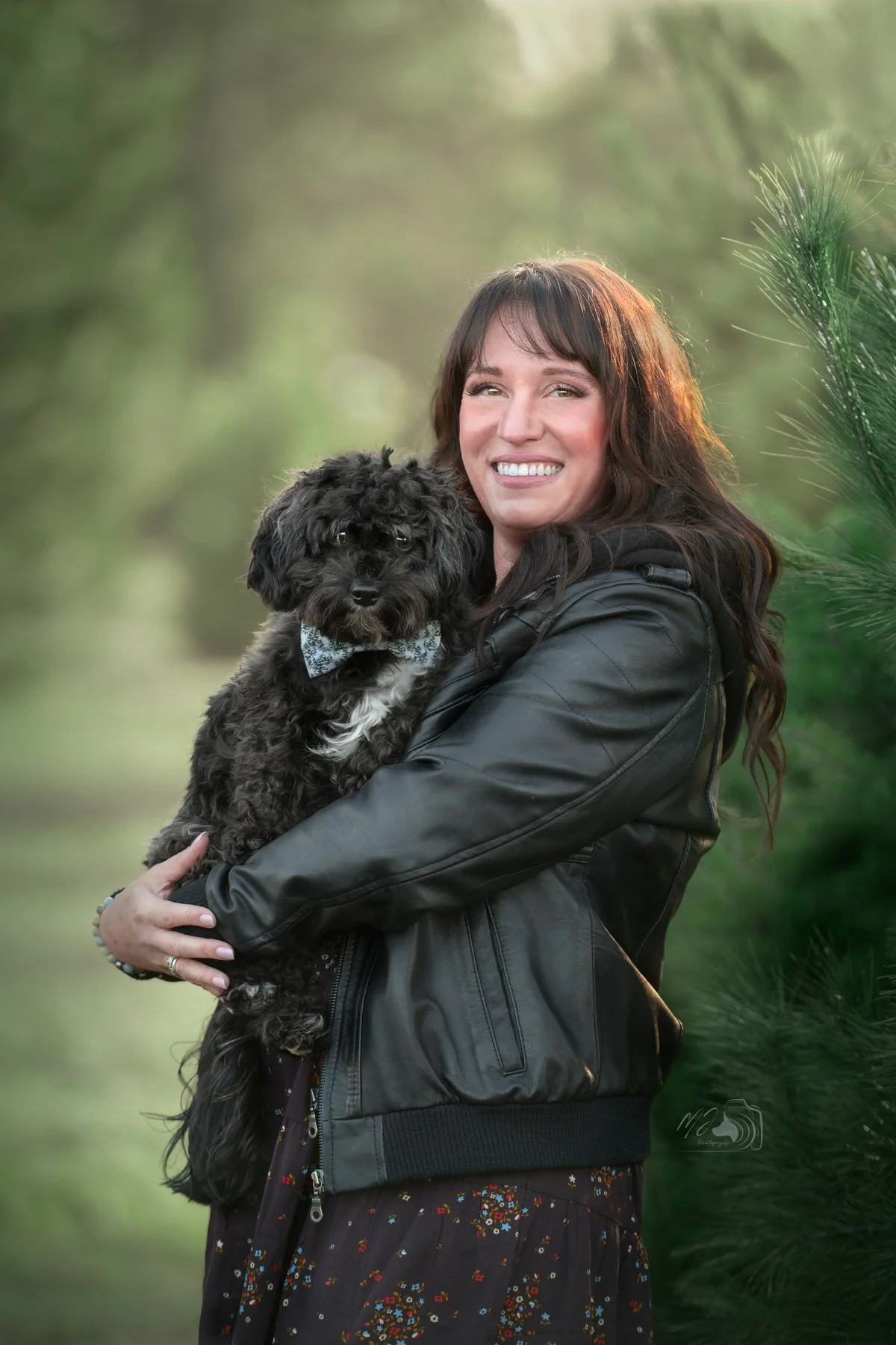 Pet Photography Quad Cities Owner holding black dog