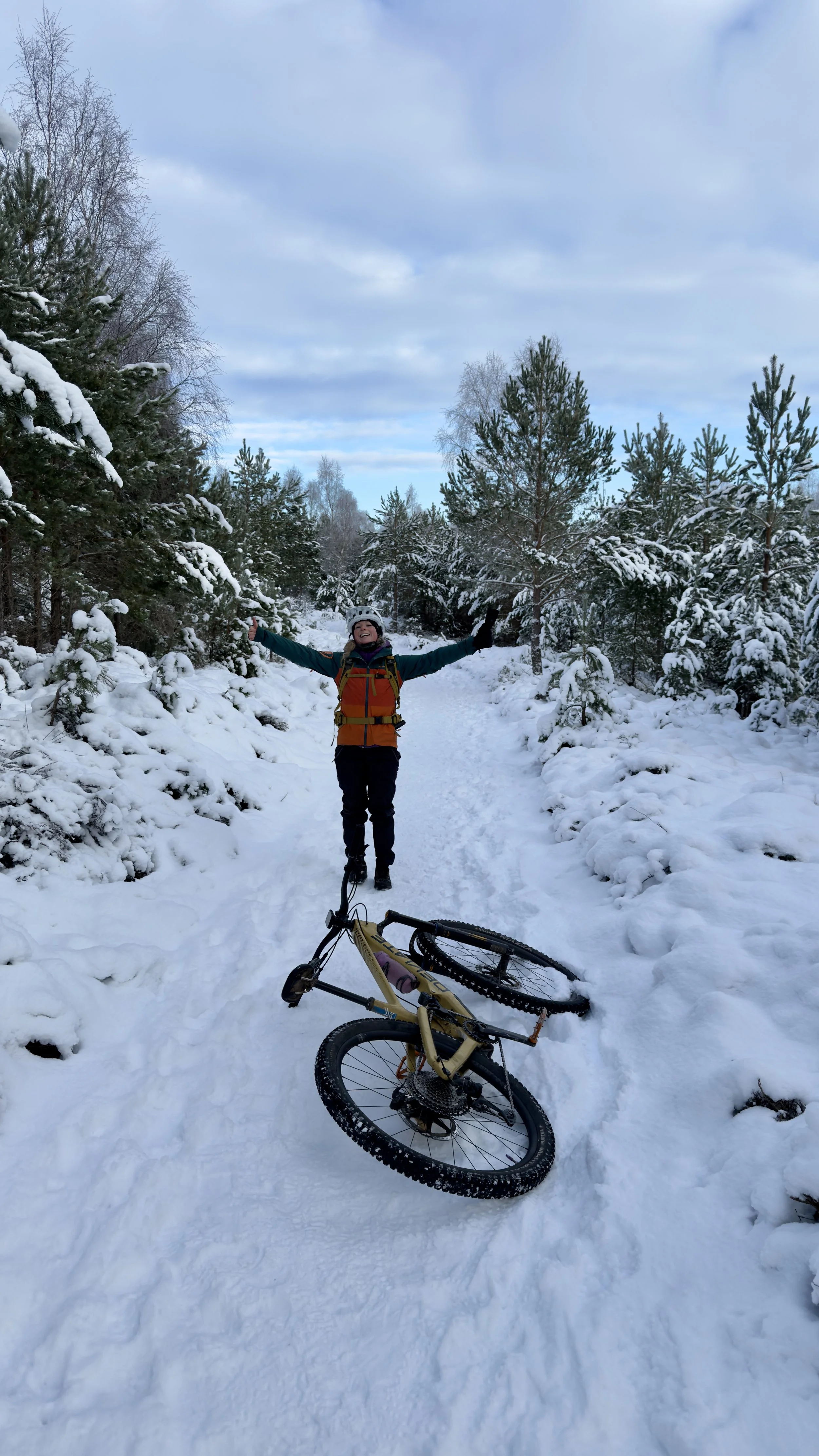 Group of mountain bikers in Christmas jumpers riding at Glentress, Riders enjoying social Christmas jumper MTB event