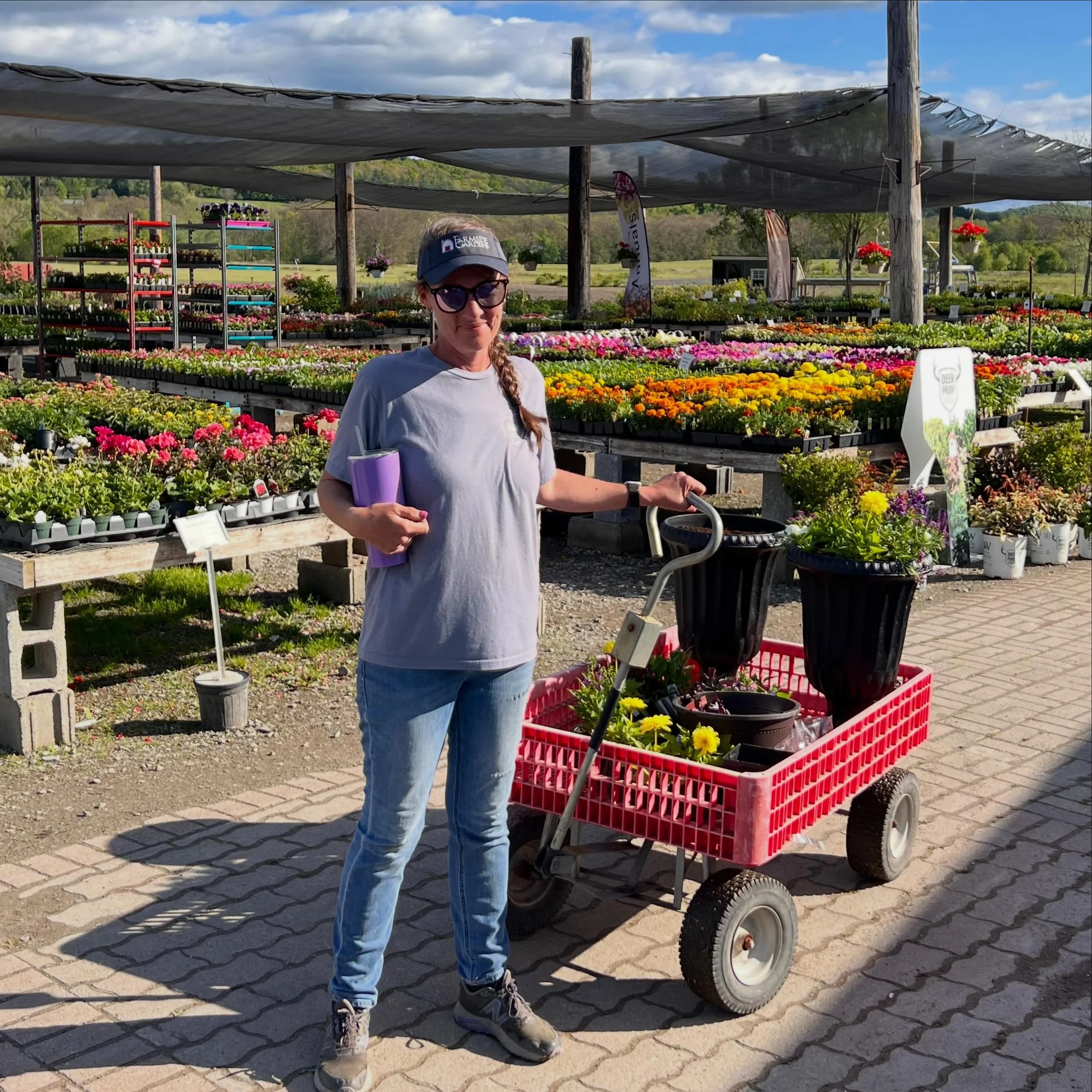 This is Aimee.
Aimee loves flowers.
Aimee has lots of plant knowledge.
Aimee loves helping customers garden successfully.
Aimee says she&rsquo;s &ldquo;just watering&rdquo; but somehow creates 14 gorgeous planters before lunch.
Come see Aimee. ☀️🌼

