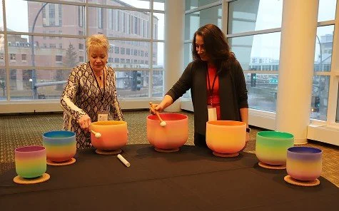 Singing bowl meditation in the Mayo Civic Center for the Community Wellness Symposium with Gail Van Kanegan