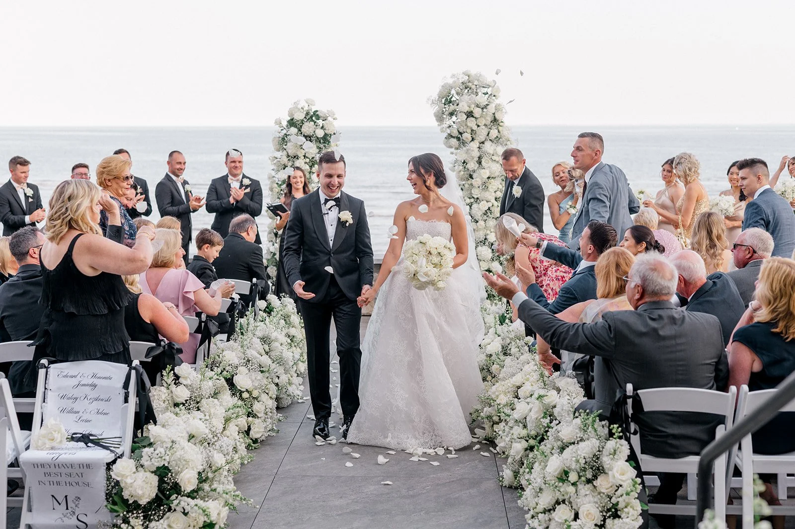 the bride & groom are married at tyde at walnut beach