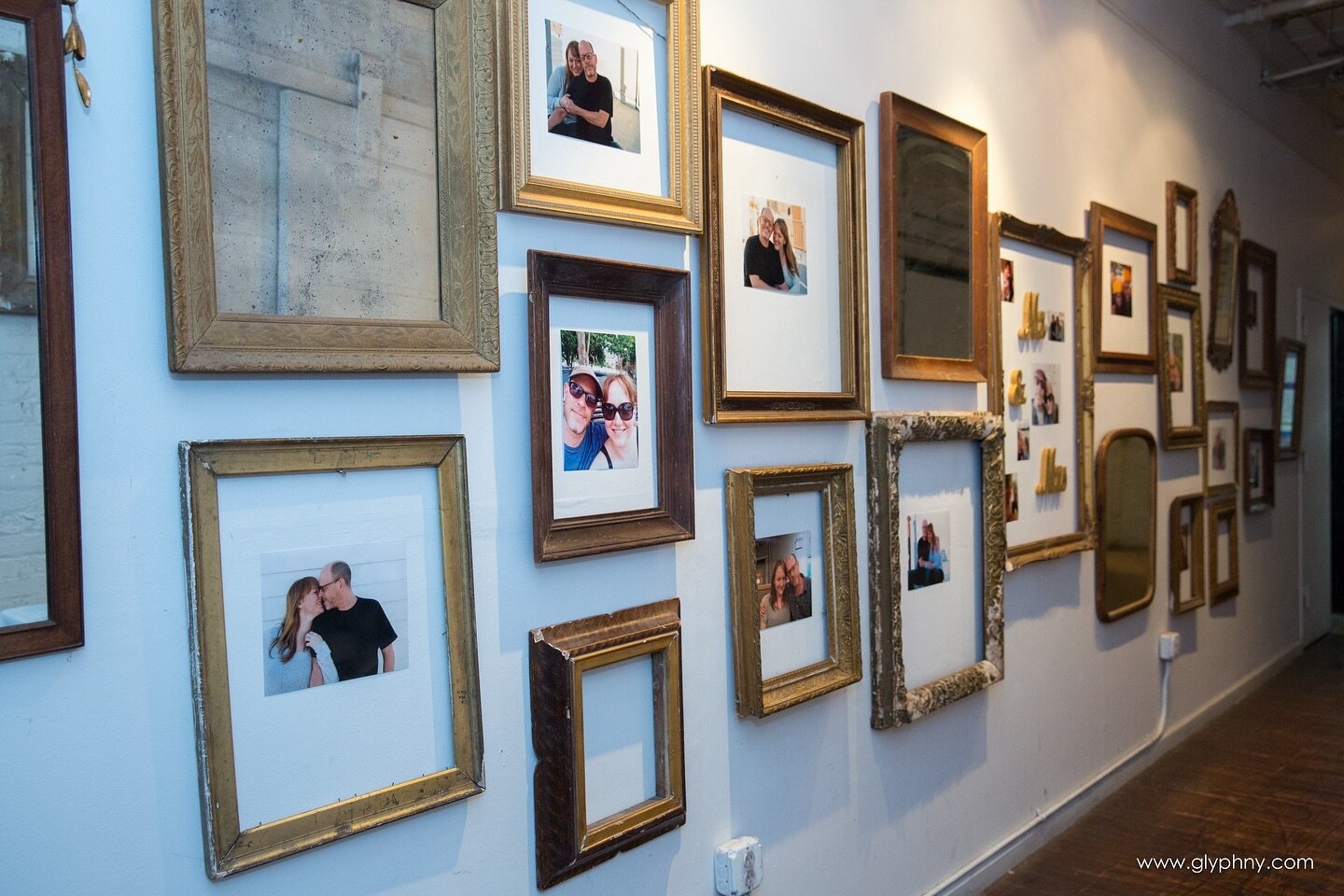 Absolutely LOVE this idea! We lined the hallway leading into the reception space with lots of photos of the bride &amp; groom over the years 😍