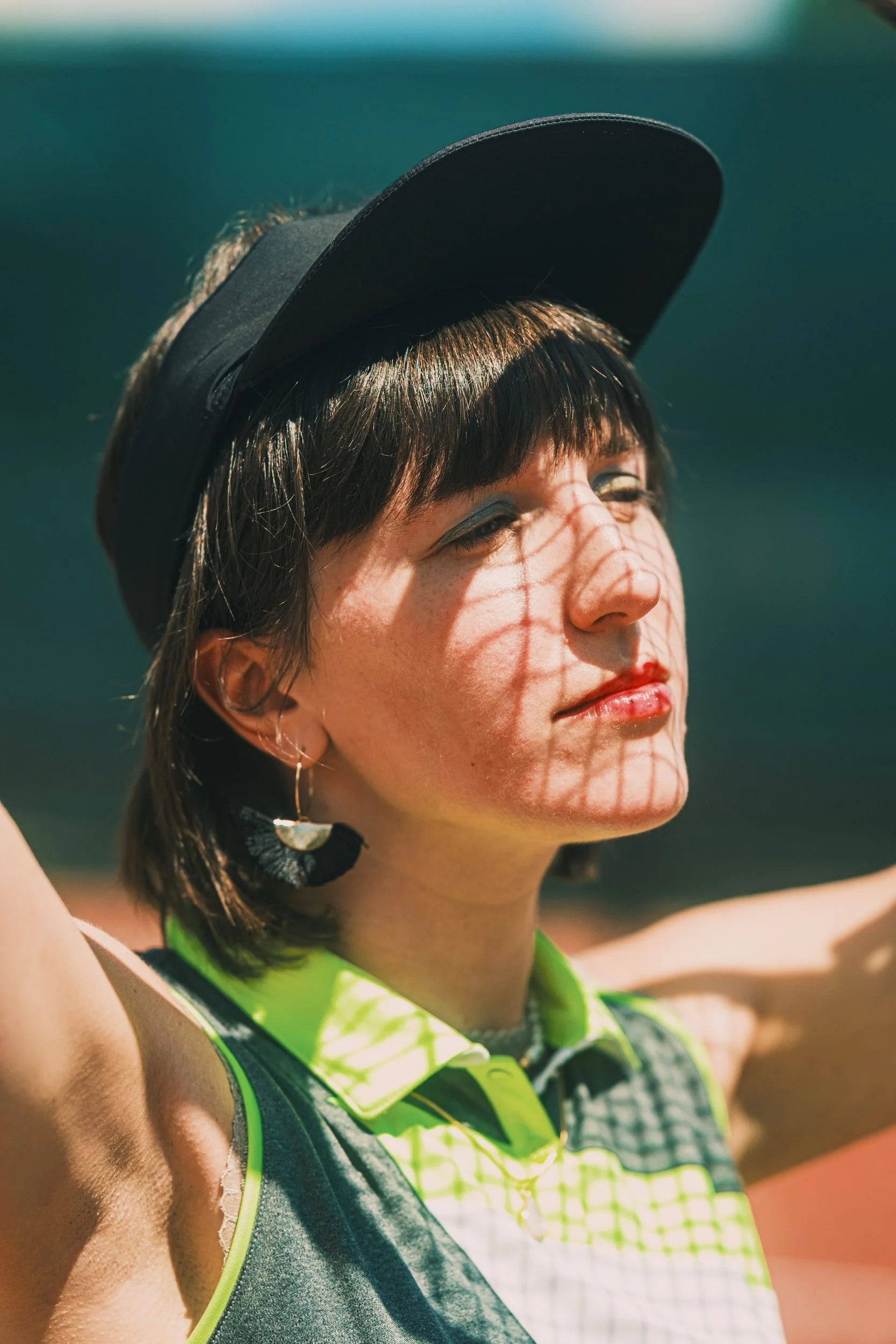 nicollete-tennis-editorial-net-shadow-portrait.jpg